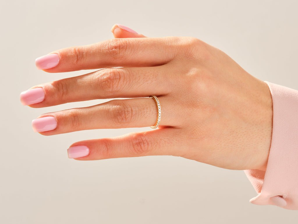 Round diamond wedding band in rose gold