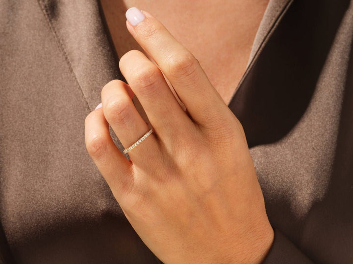 Side view of round diamond wedding band