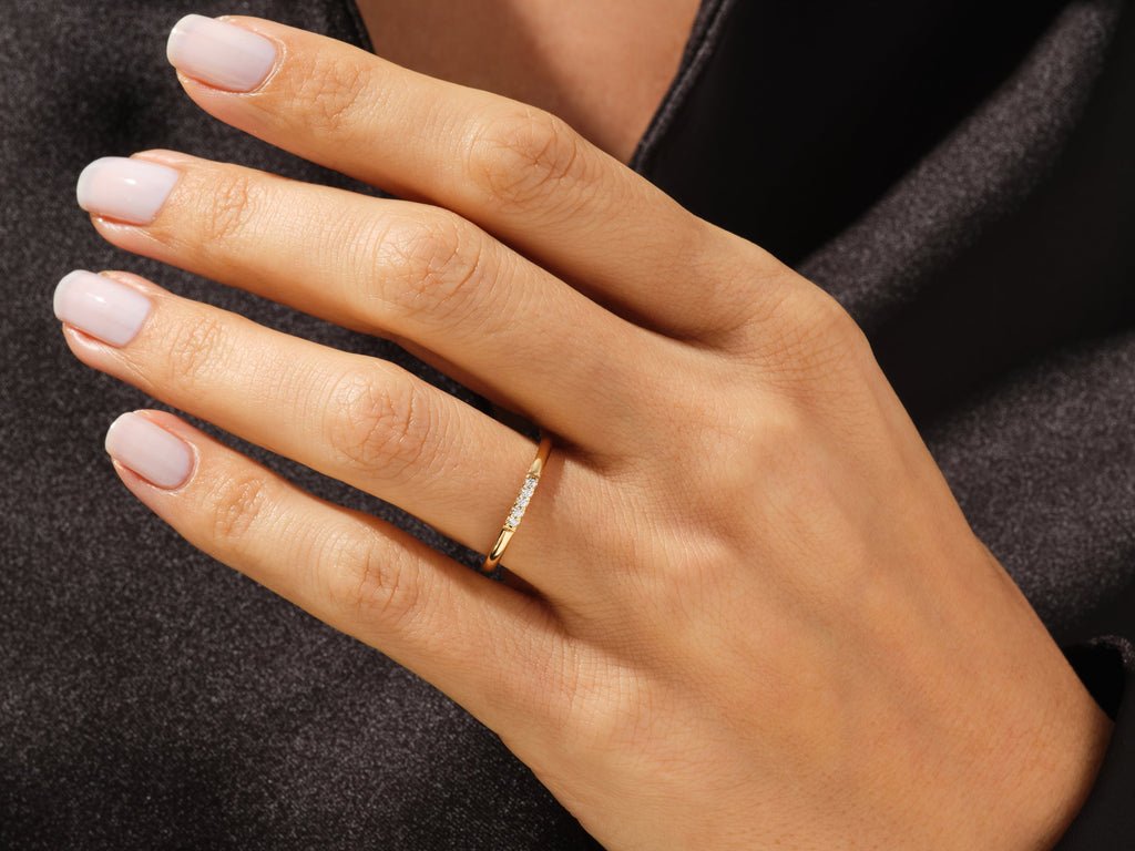Side view of round diamond wedding band