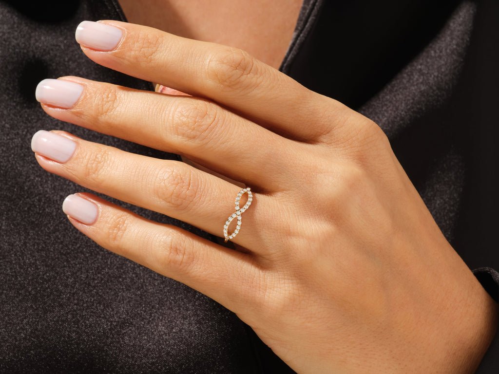 Round diamond band stacked with engagement ring