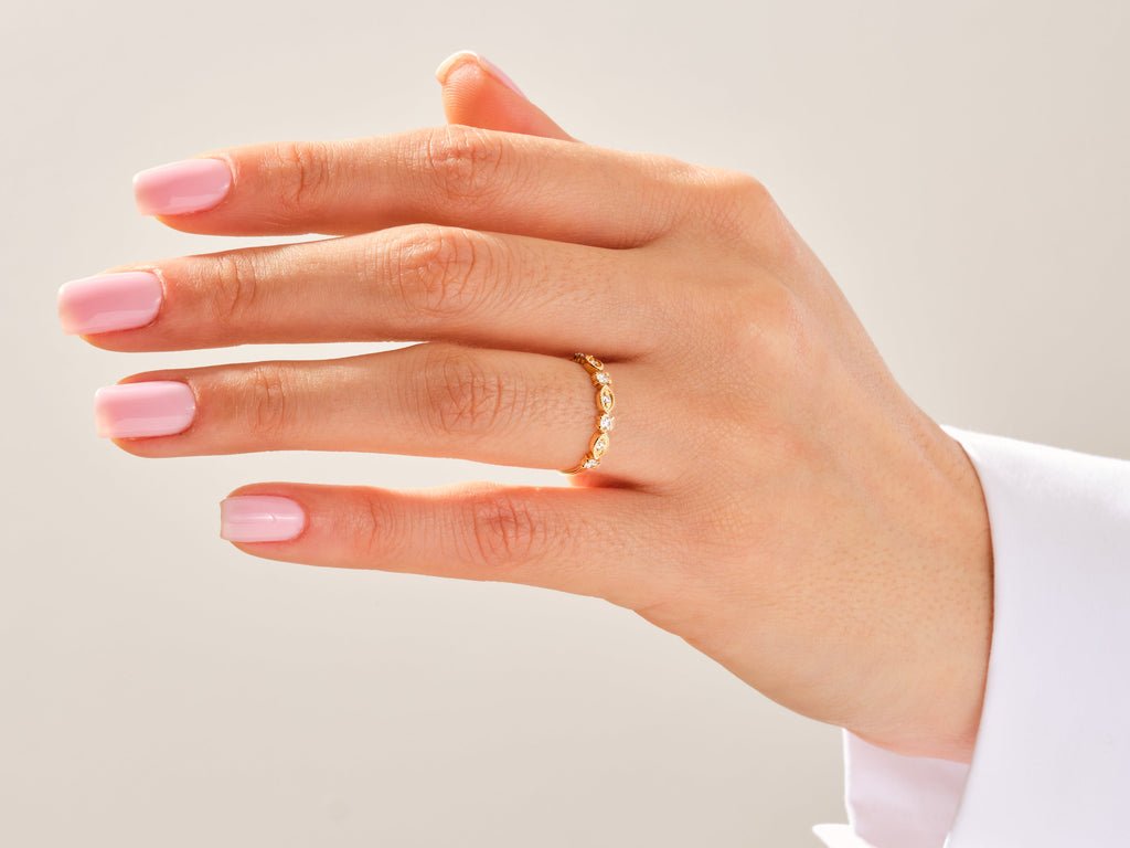 Side view of round diamond wedding band