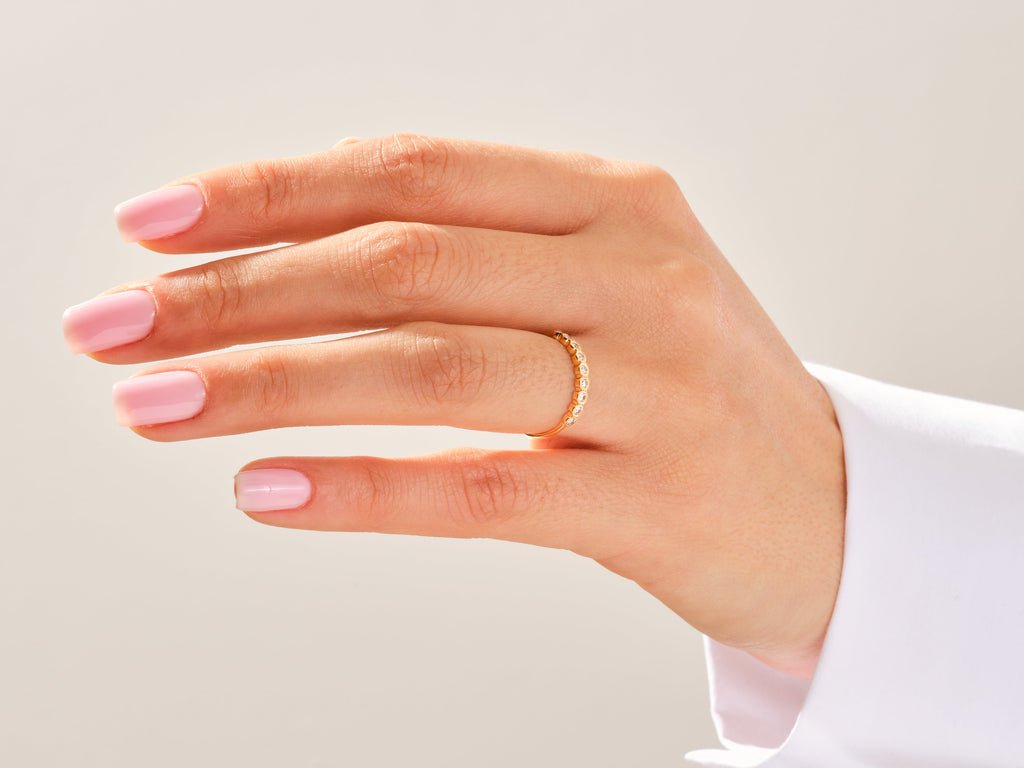 Side view of round diamond wedding band