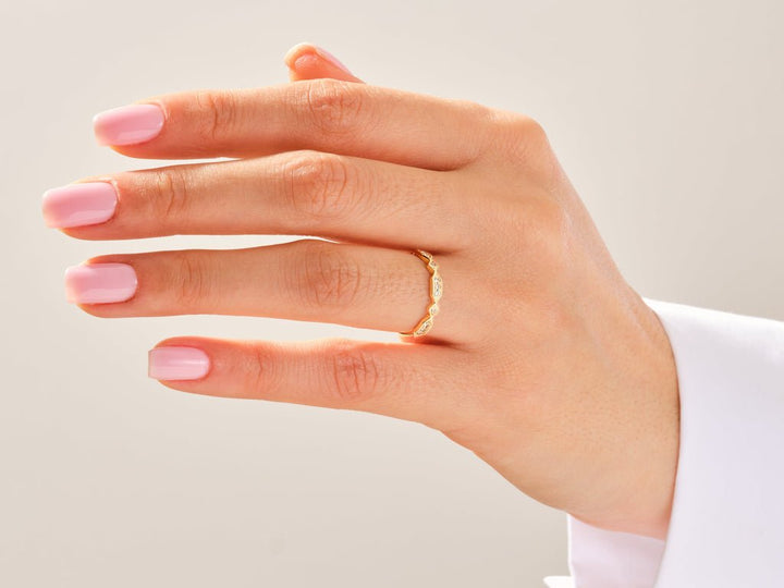 Side view of round diamond wedding band