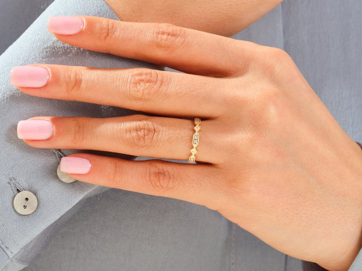 Round lab grown diamond band worn on hand