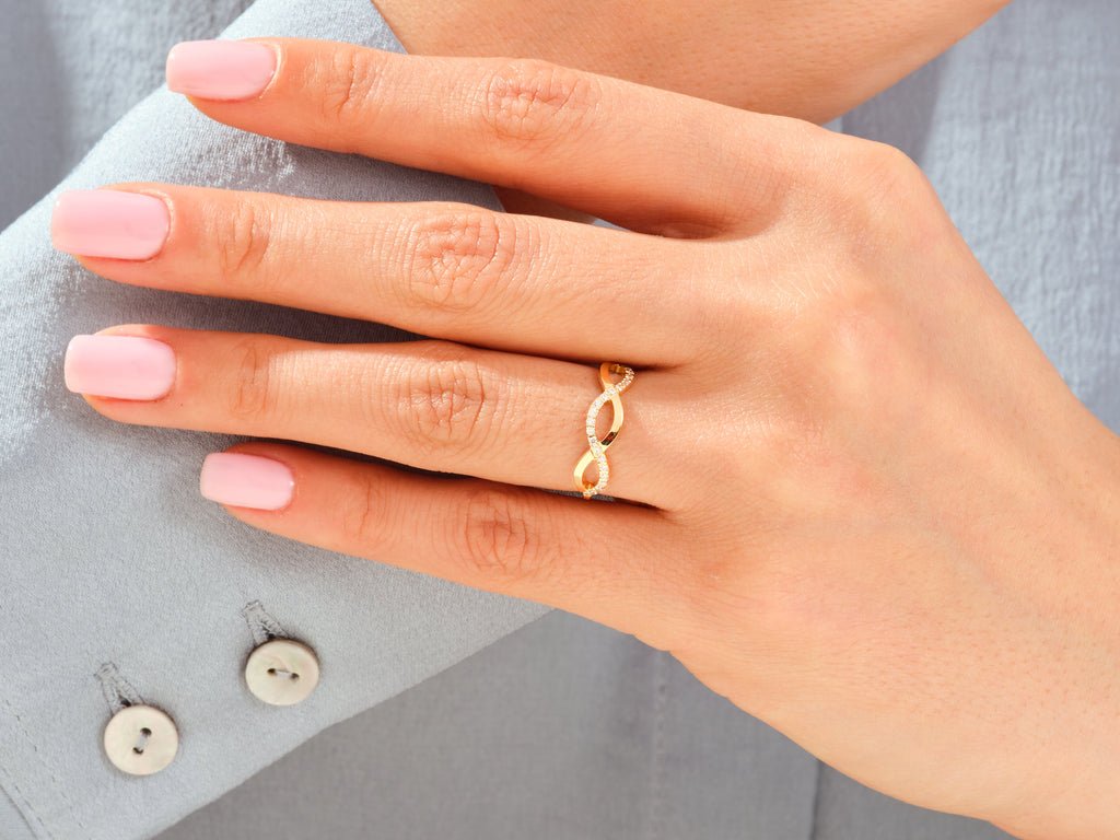 Round diamond wedding band in rose gold
