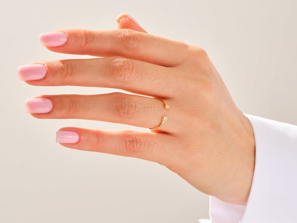 Round diamond wedding band in rose gold