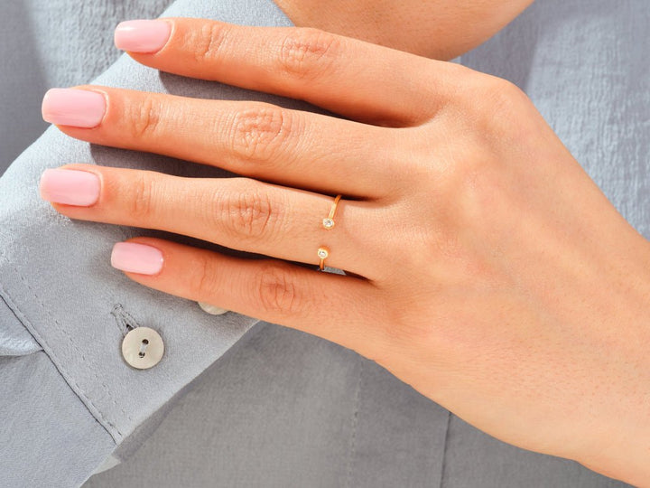 Round lab grown diamond band worn on hand
