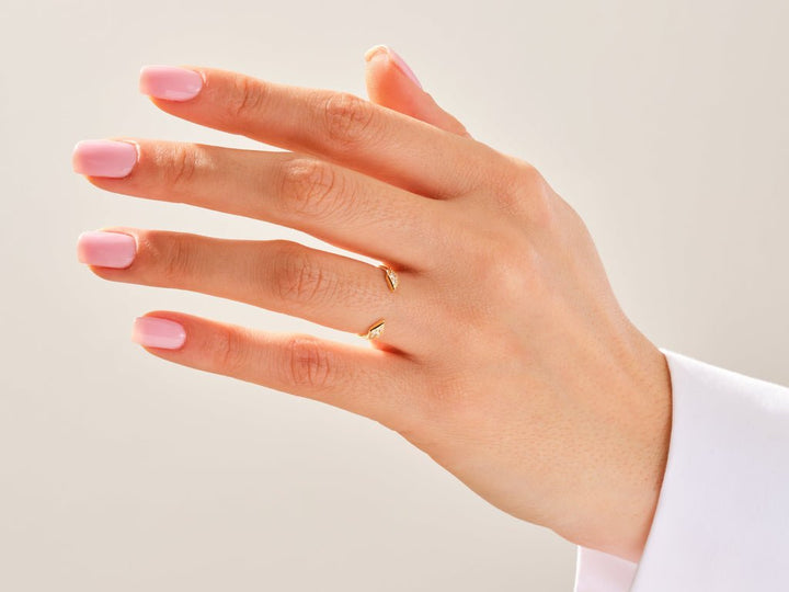 Round diamond wedding band in rose gold