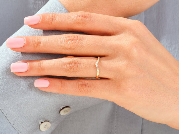 Round lab grown diamond band worn on hand