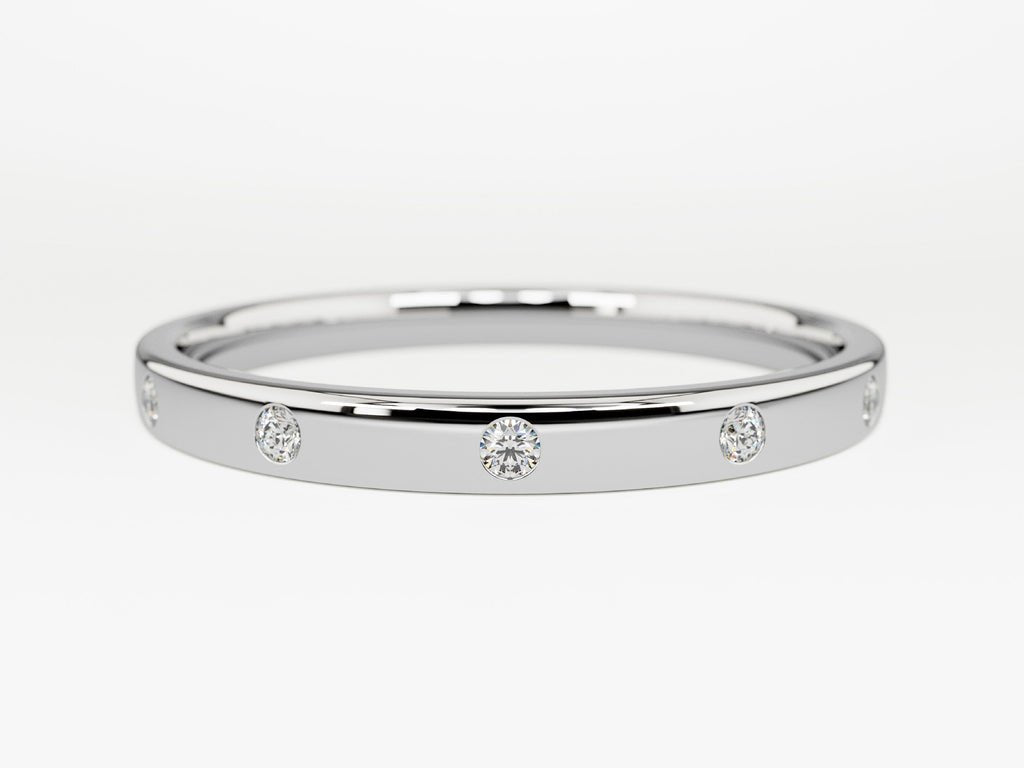 Round diamond band stacked with engagement ring
