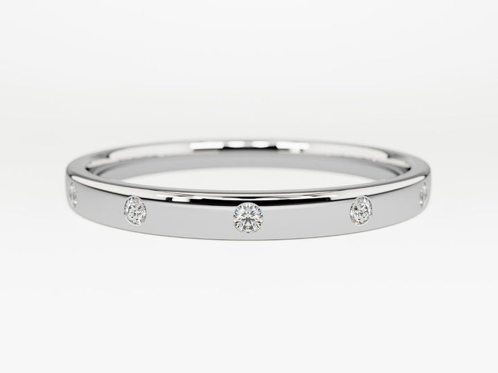 Round diamond band stacked with engagement ring