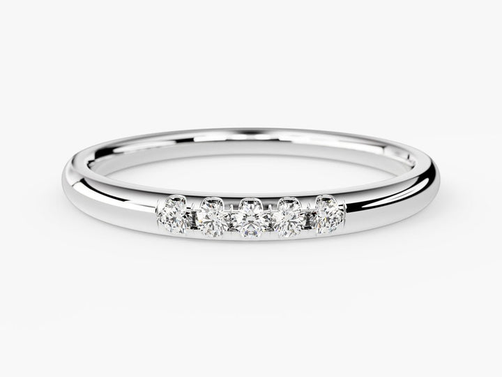 Round diamond band stacked with engagement ring