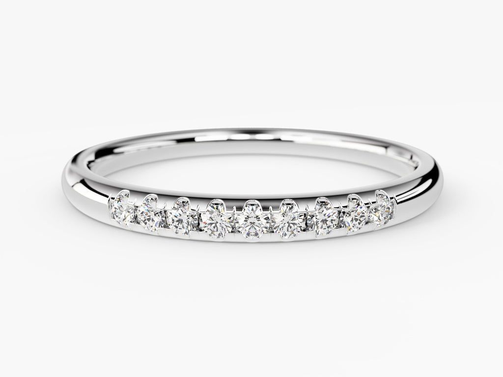 Round diamond band stacked with engagement ring