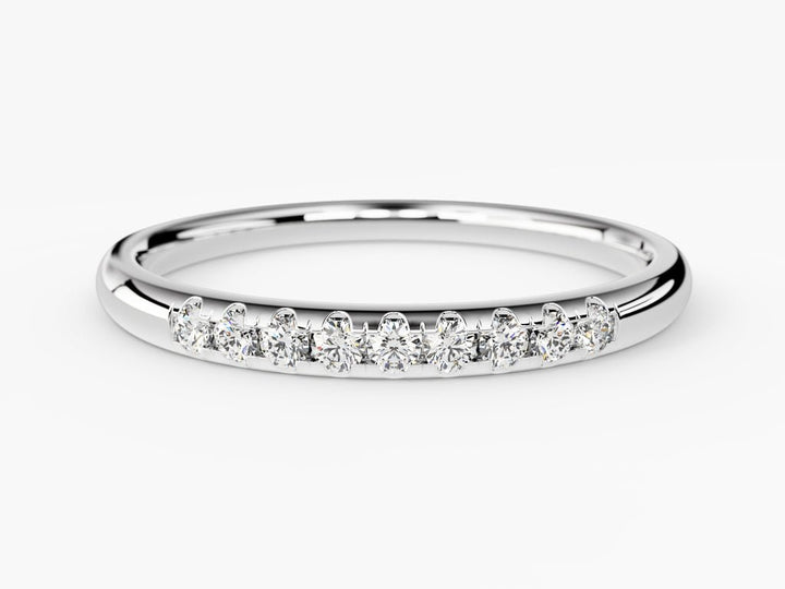 Round diamond band stacked with engagement ring