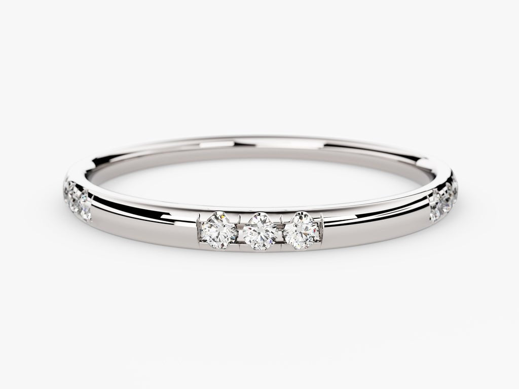 Round diamond band stacked with engagement ring