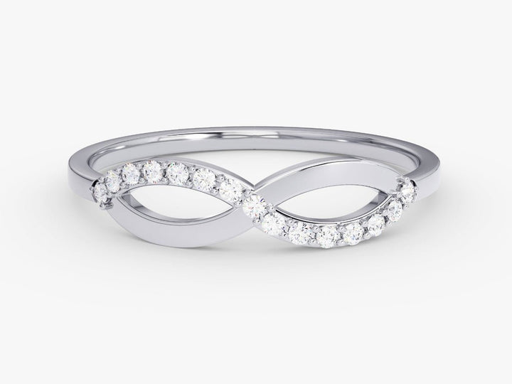 Round diamond band stacked with engagement ring