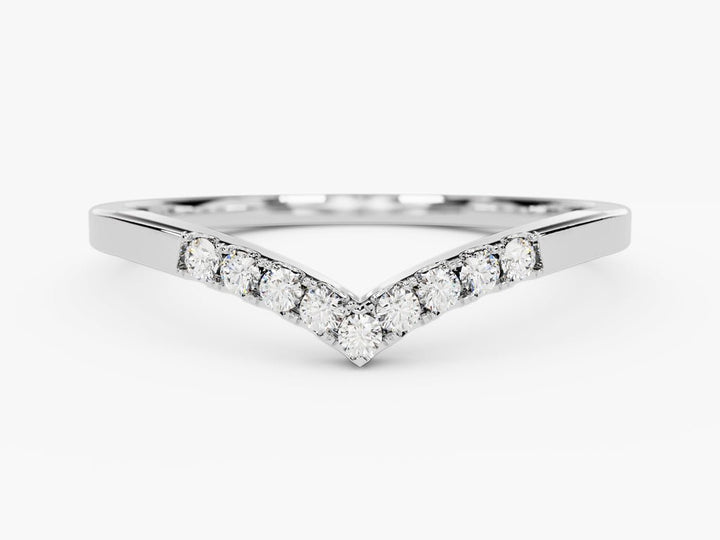 Round diamond band stacked with engagement ring
