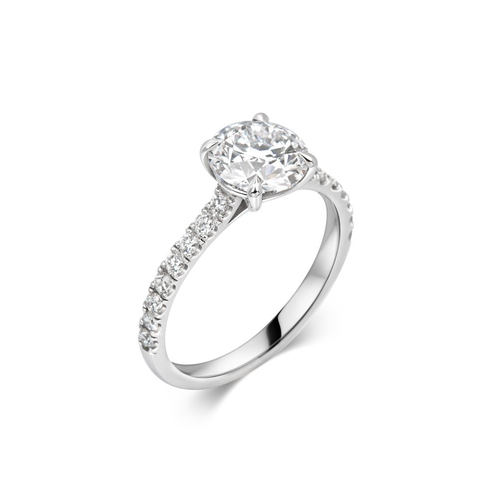 Round pave engagement ring shown on hand for true-to-life sizing