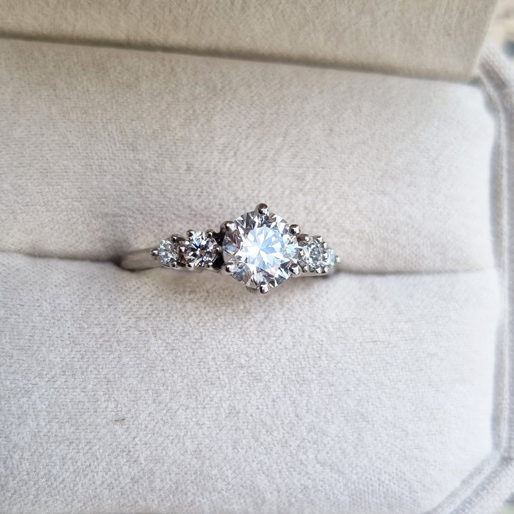 Shop the round cut five stone engagement ring collection online