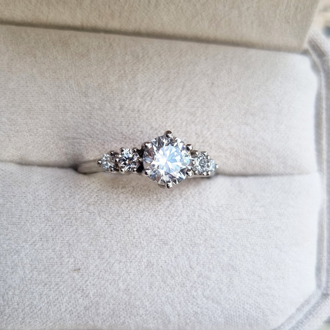 Shop the round cut five stone engagement ring collection online