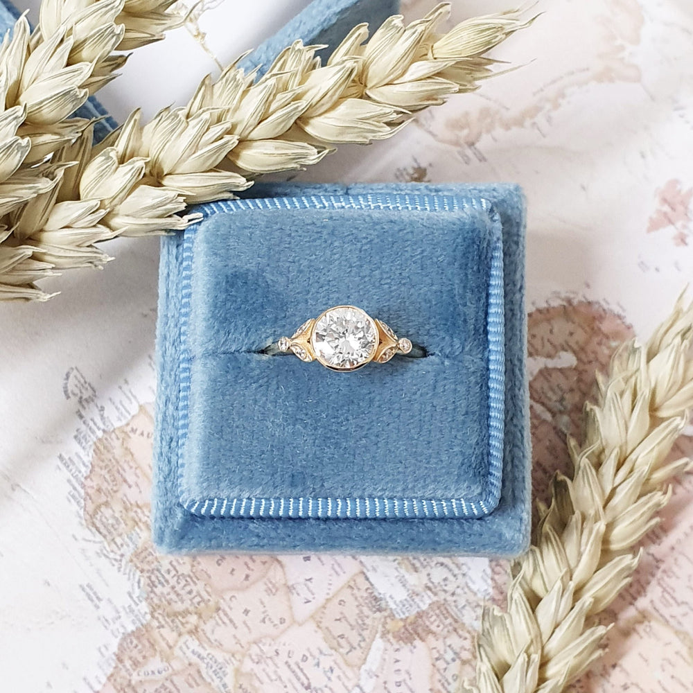 Handcrafted round cut bezel lab grown diamond engagement ring