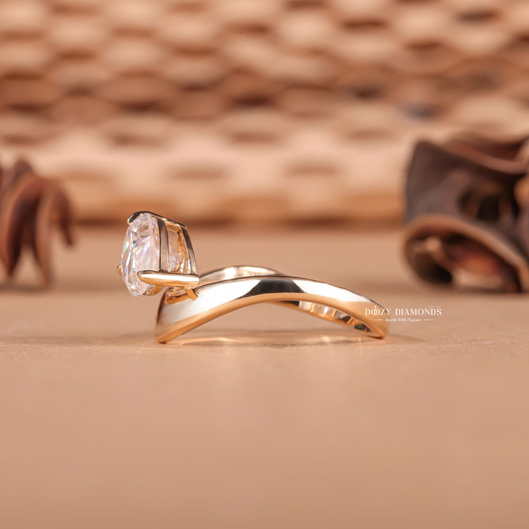 Pear cut dome engagement ring shown in real-life wear