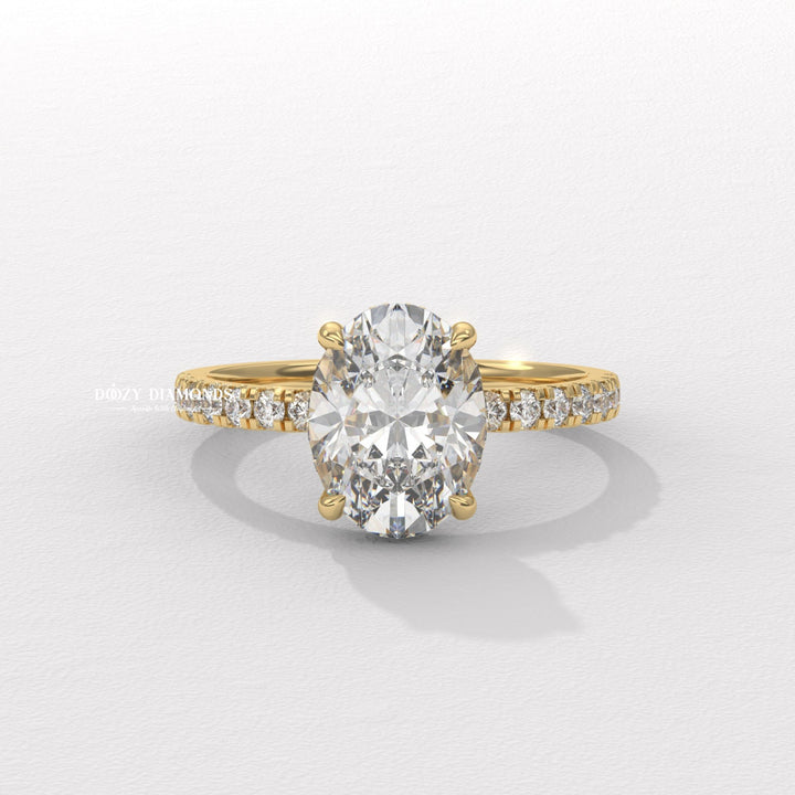 Oval cut hidden halo engagement ring available to buy now