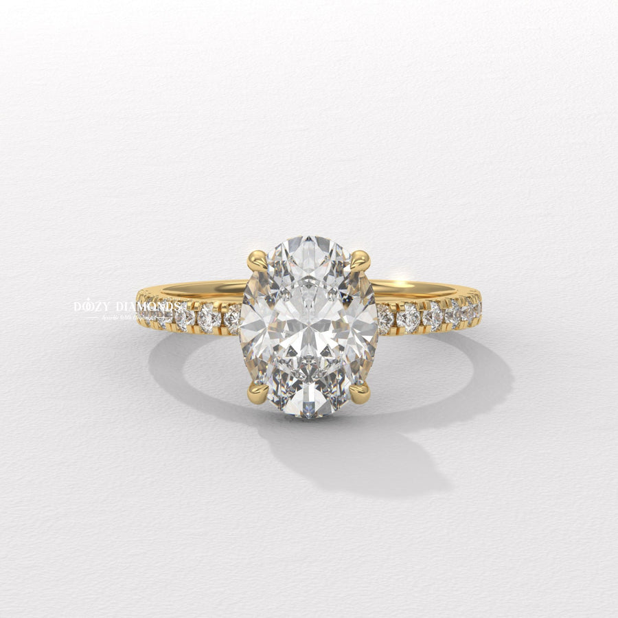 Oval cut hidden halo engagement ring available to buy now