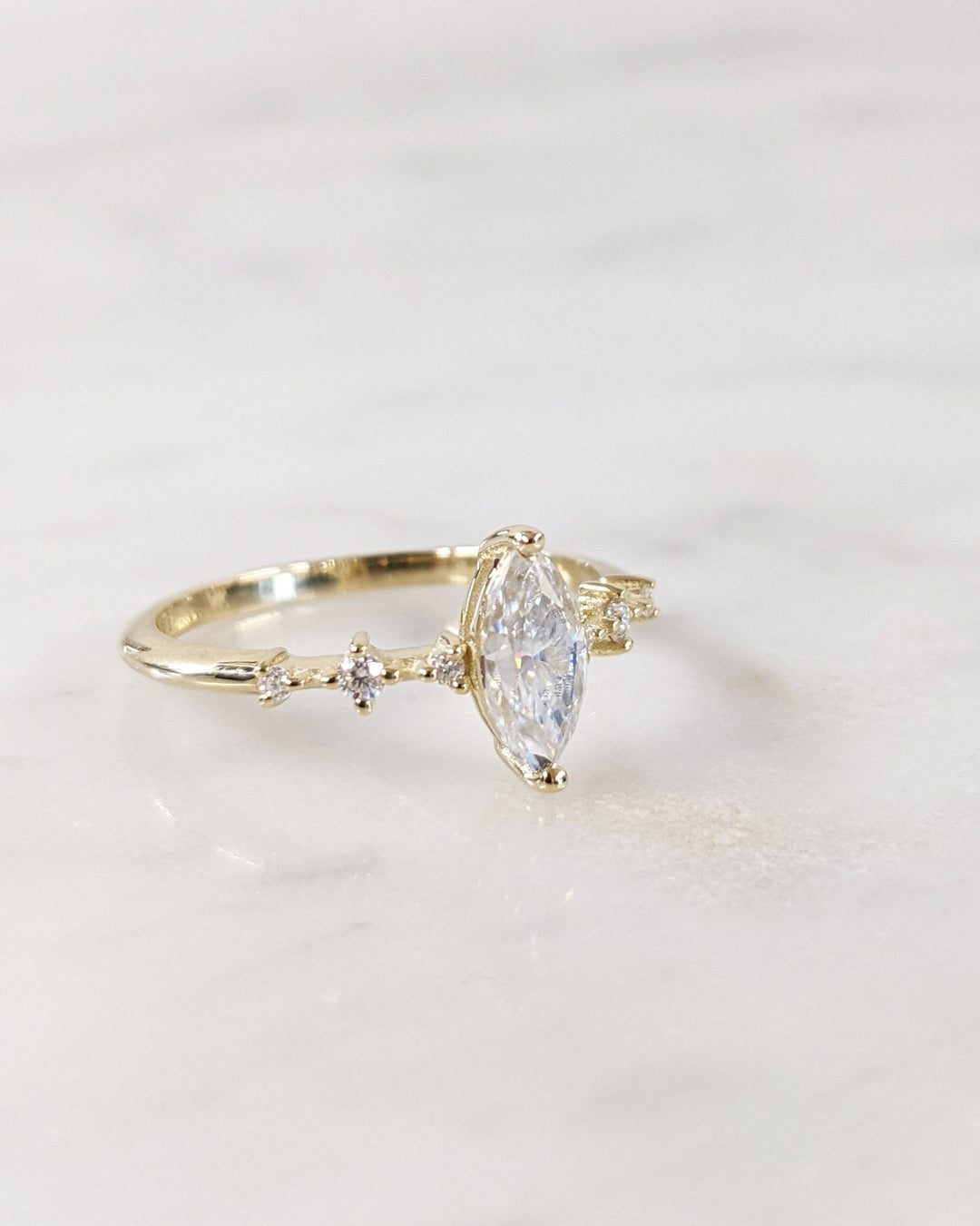 Marquise pave engagement ring close-up highlighting diamond sparkle