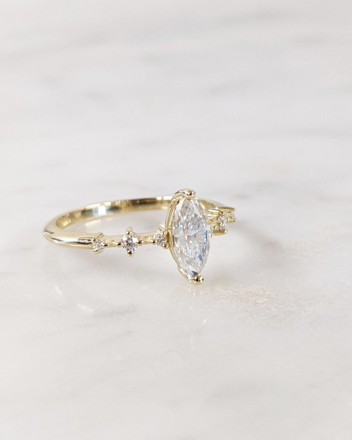 Marquise pave engagement ring close-up highlighting diamond sparkle