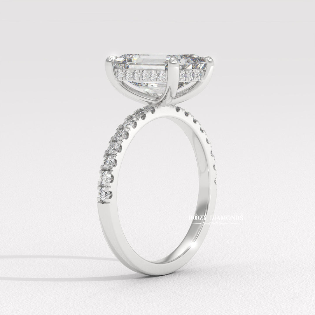 Emerald cut engagement ring side view showing band detail