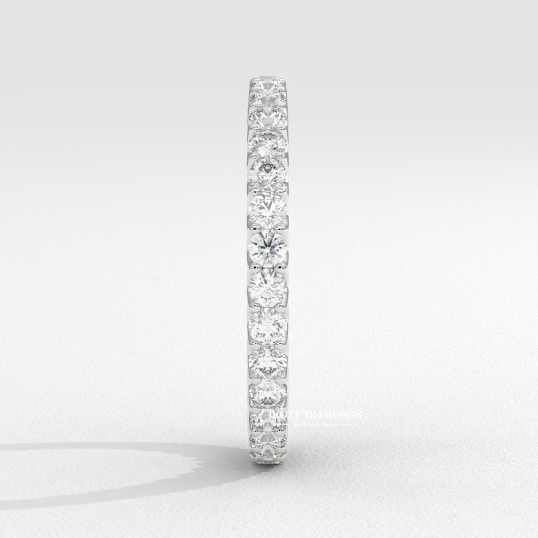Side view of round diamond wedding band