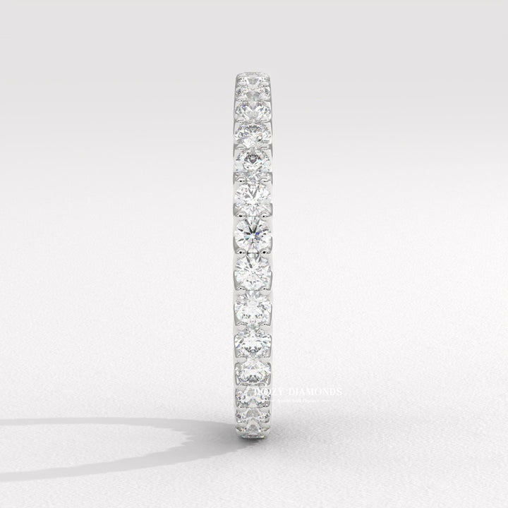 Side view of round diamond wedding band