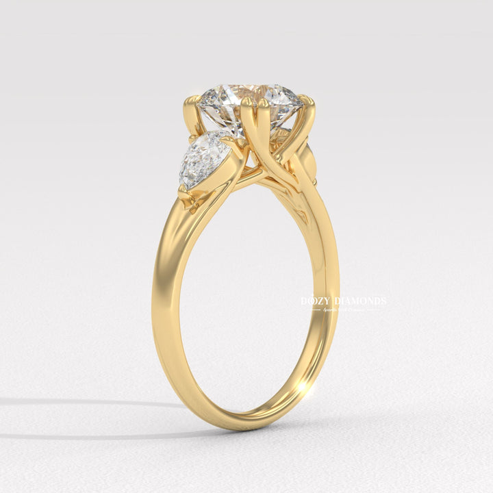 Detailed close-up of round three stone diamond engagement ring