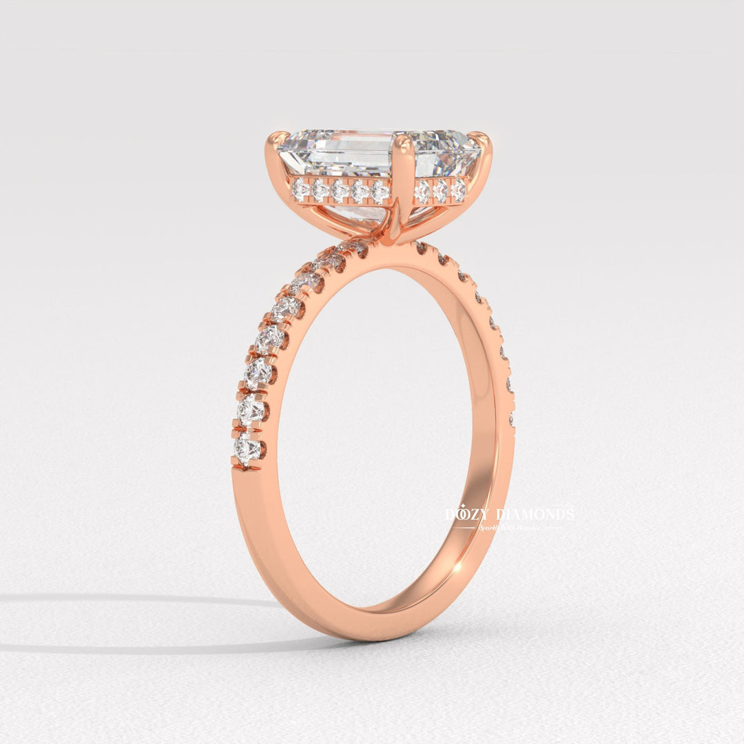 Emerald pave ring set with an IGI graded diamond