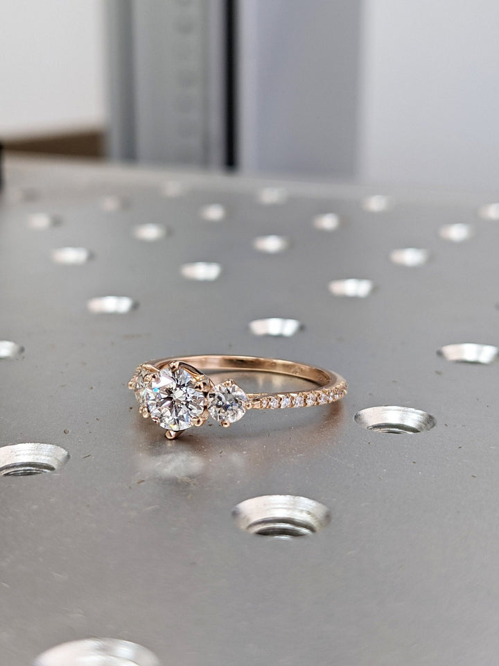 Side angle of round solitaire diamond engagement ring