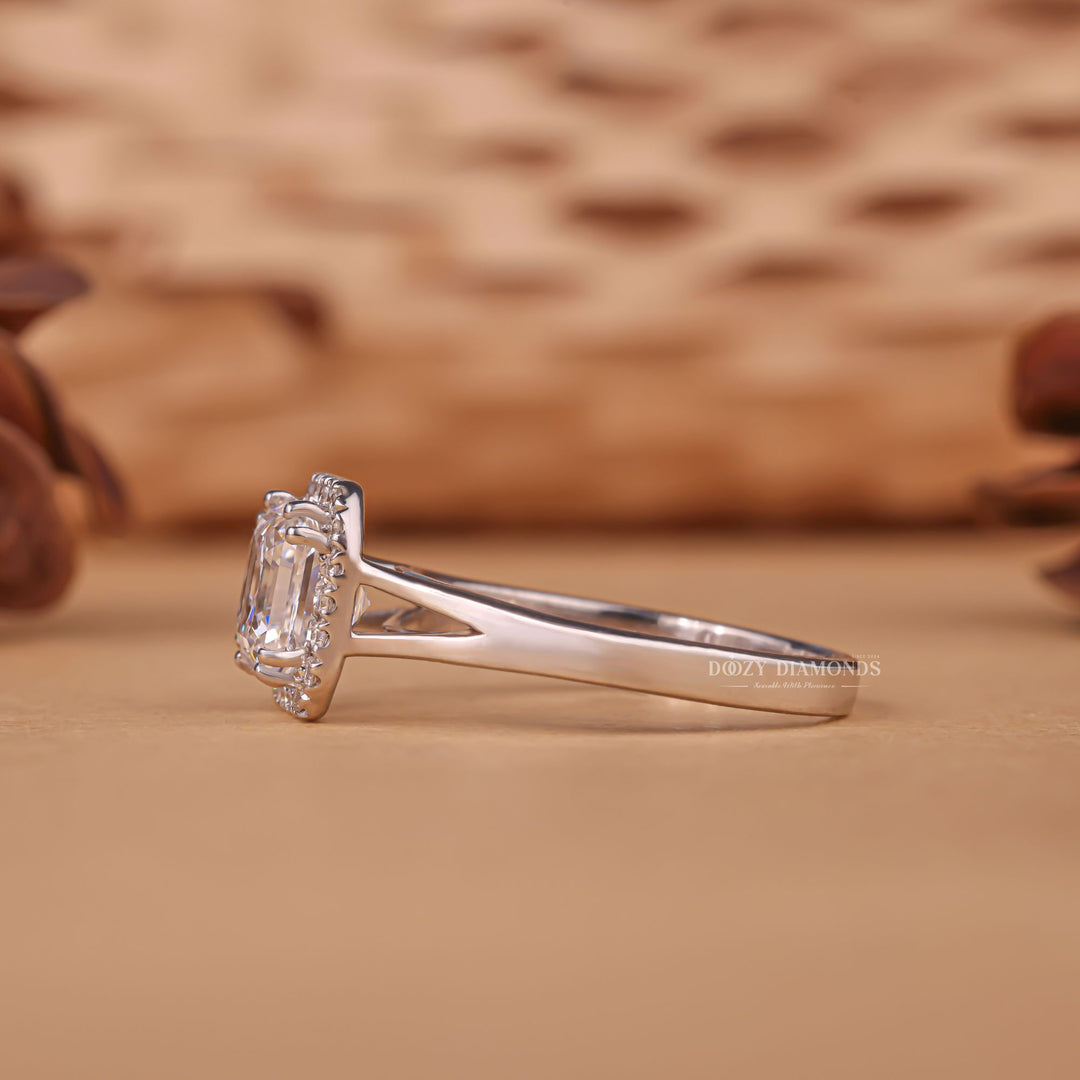 Macro shot of asscher cut diamond facets in halo ring setting