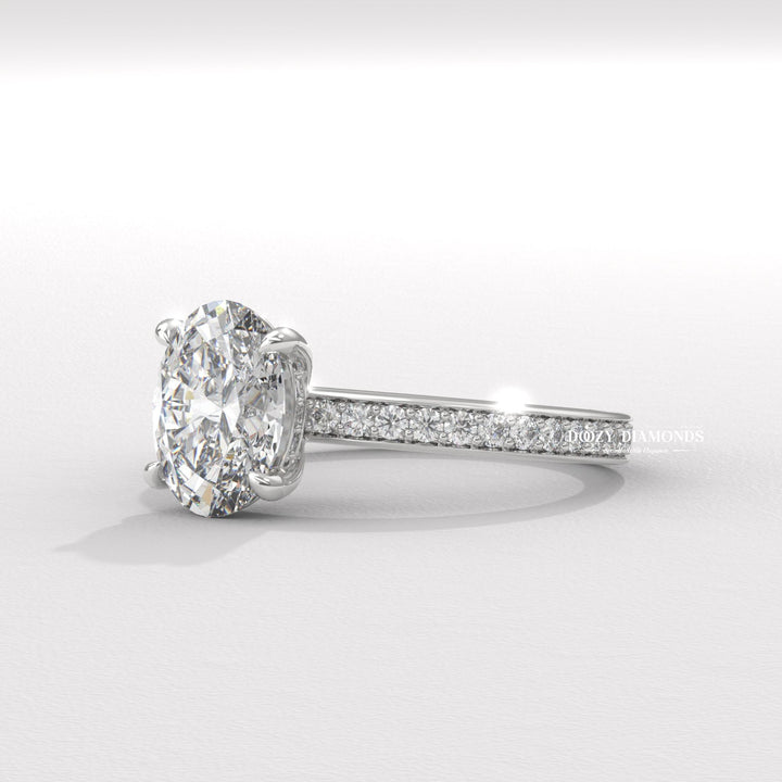 Side angle of oval solitaire diamond engagement ring