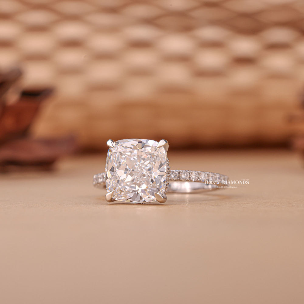 Cushion cut engagement ring side view showing band detail