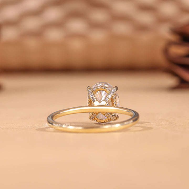 Premium oval cut hidden halo engagement ring crafted in solid gold