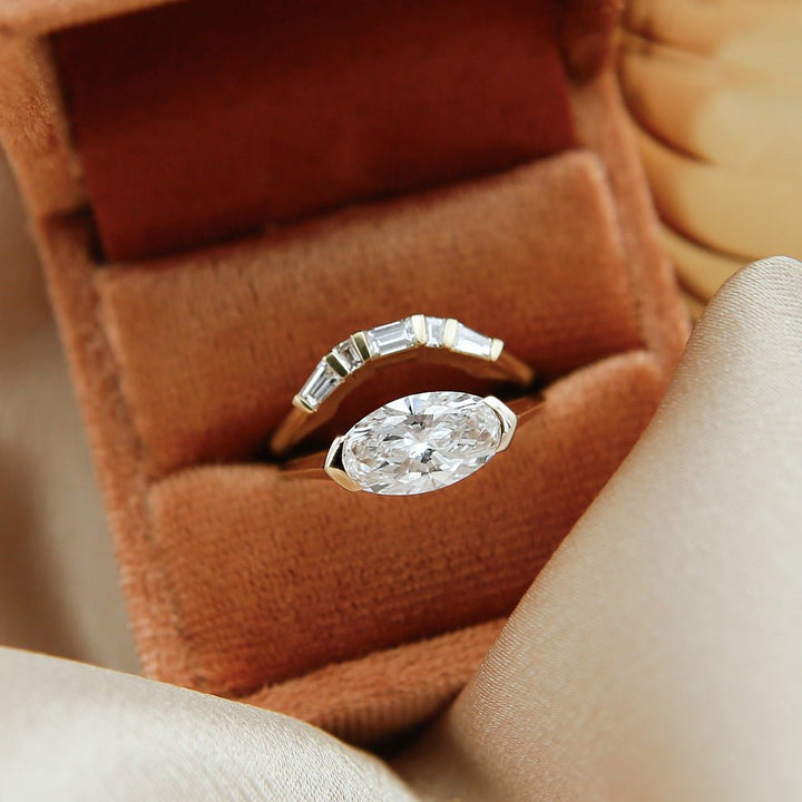 Baguette diamond band stacked with engagement ring