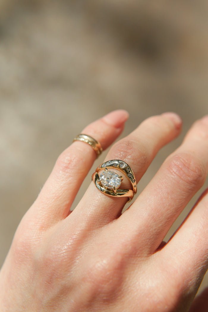 Side view of round diamond wedding band