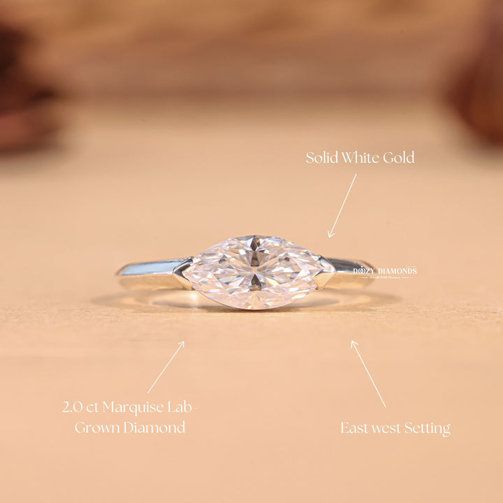 Marquise cut diamond ring worn on hand