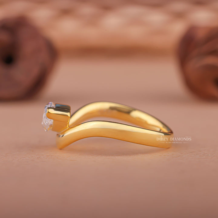 Marquise east west lab grown diamond ring side profile in gold setting