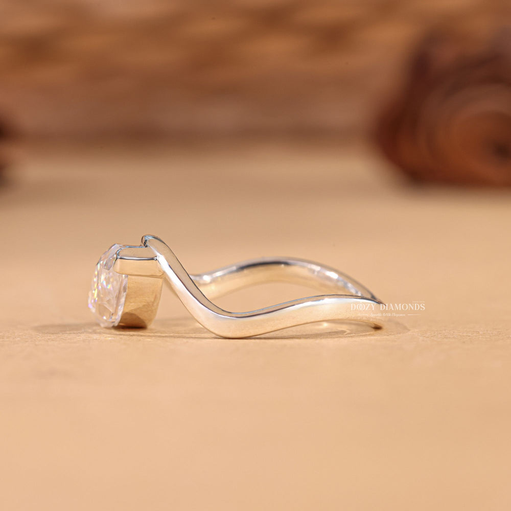 Marquise solitaire engagement ring finished in polished solid gold