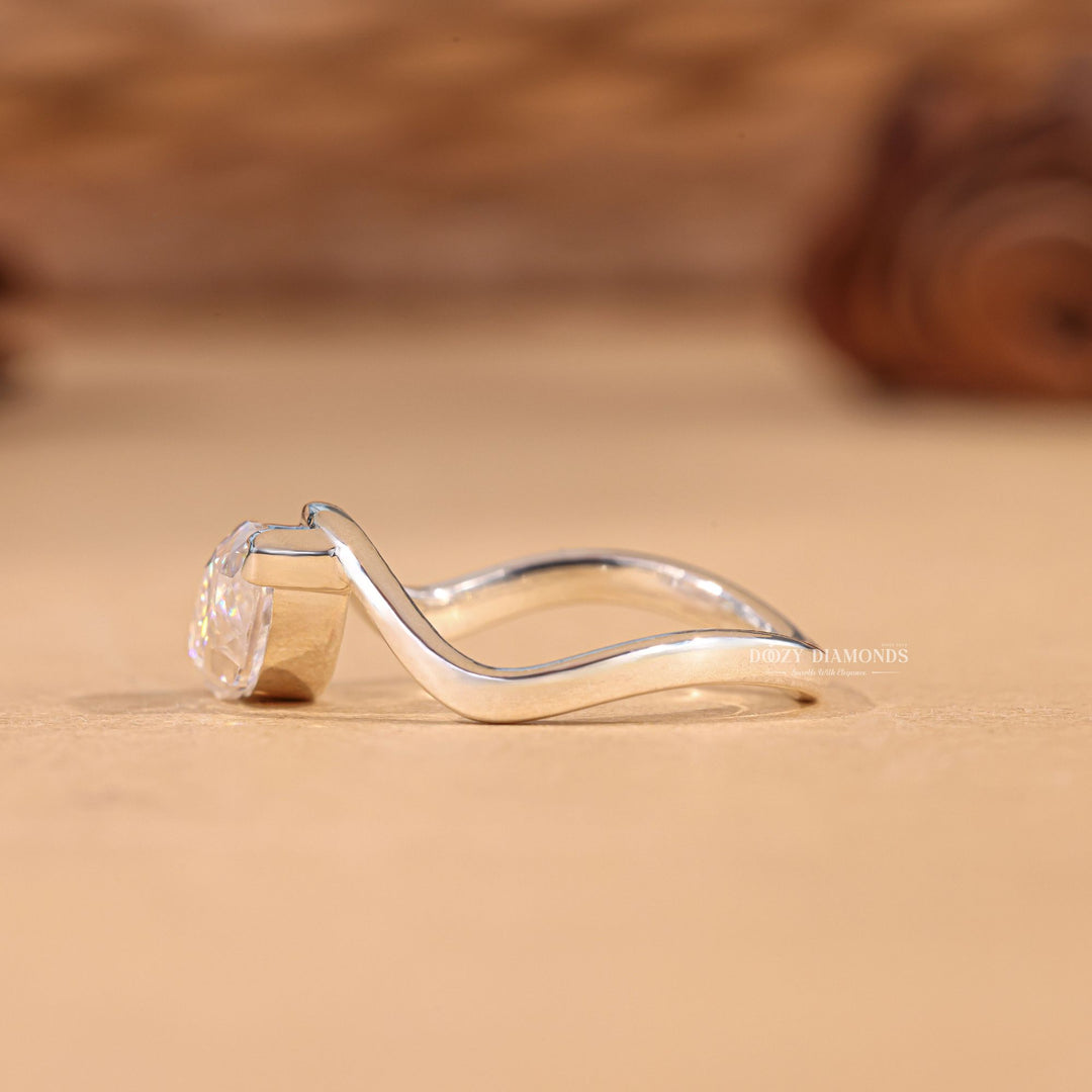 Marquise solitaire engagement ring finished in polished solid gold