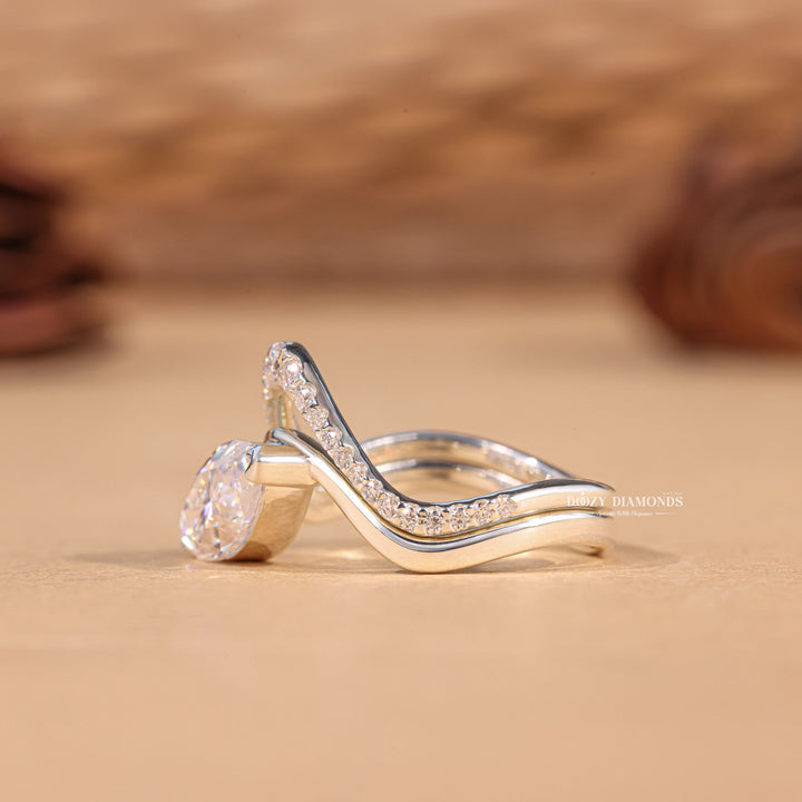 Marquise cut bridal set with enhancer, Marquise cut bridal set with halo, Marquise cut bridal set with side stones, Marquise cut bridal set with diamond accents