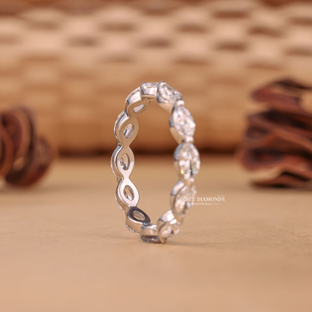 Eternity diamond band stacked with engagement ring