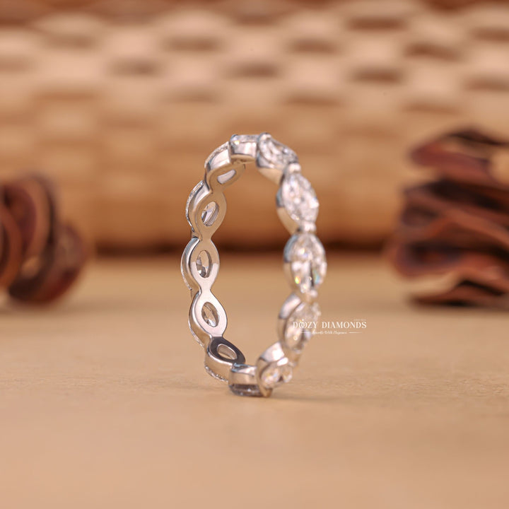 Eternity diamond band stacked with engagement ring