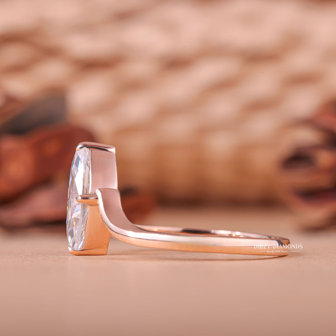 Marquise solitaire diamond ring presented in signature gift packaging